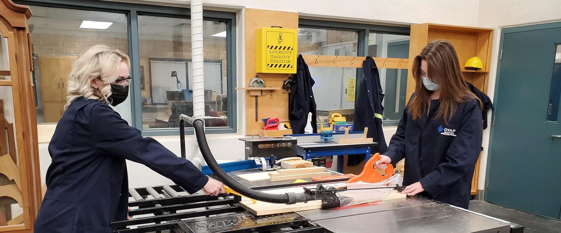 Students using saw